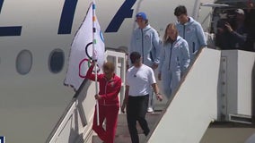 Los Angeles Mayor brings home Olympic flag