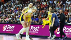 LA Sparks rookie Cameron Brink helped off the court after suffering knee injury